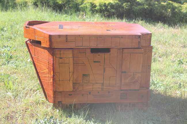 Hiding behind those wooden tracks are some wheels, so this Sandcrawler rolls about properly.